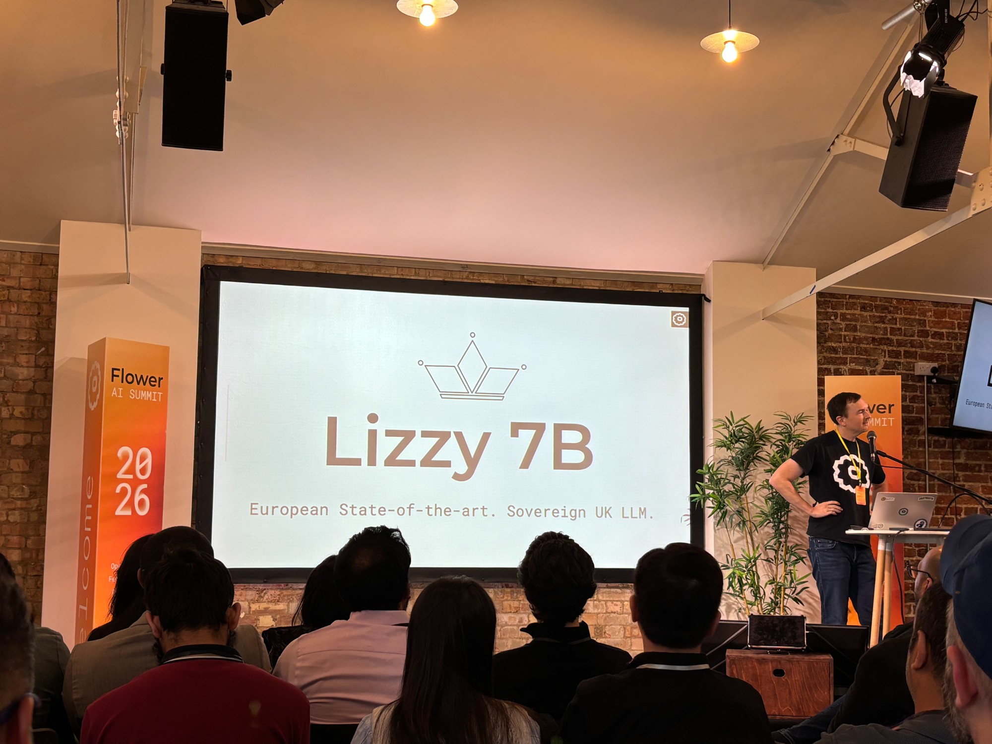 Nicholas Lane presenting Lizzy 7B at the Flower AI Summit 2026